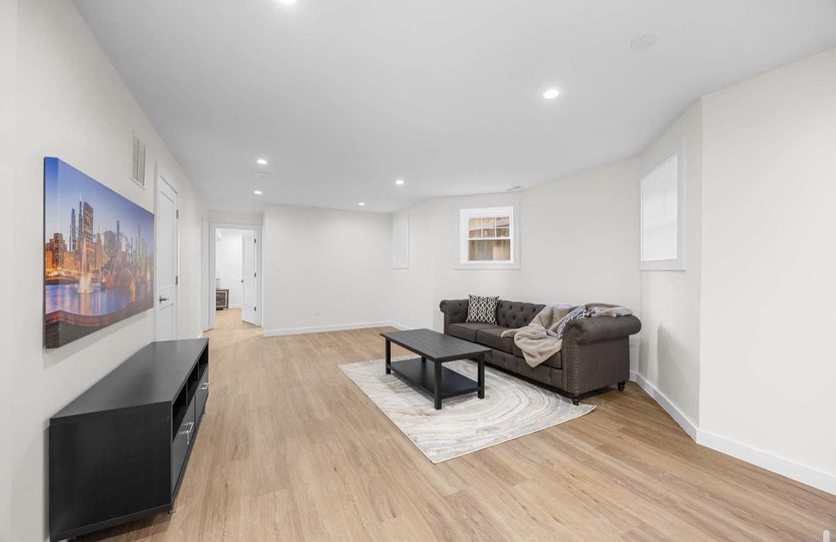 Basement living room with recessed lighting