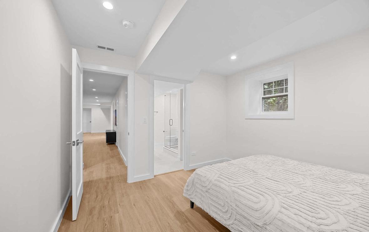 Basement bedroom with recessed lighting